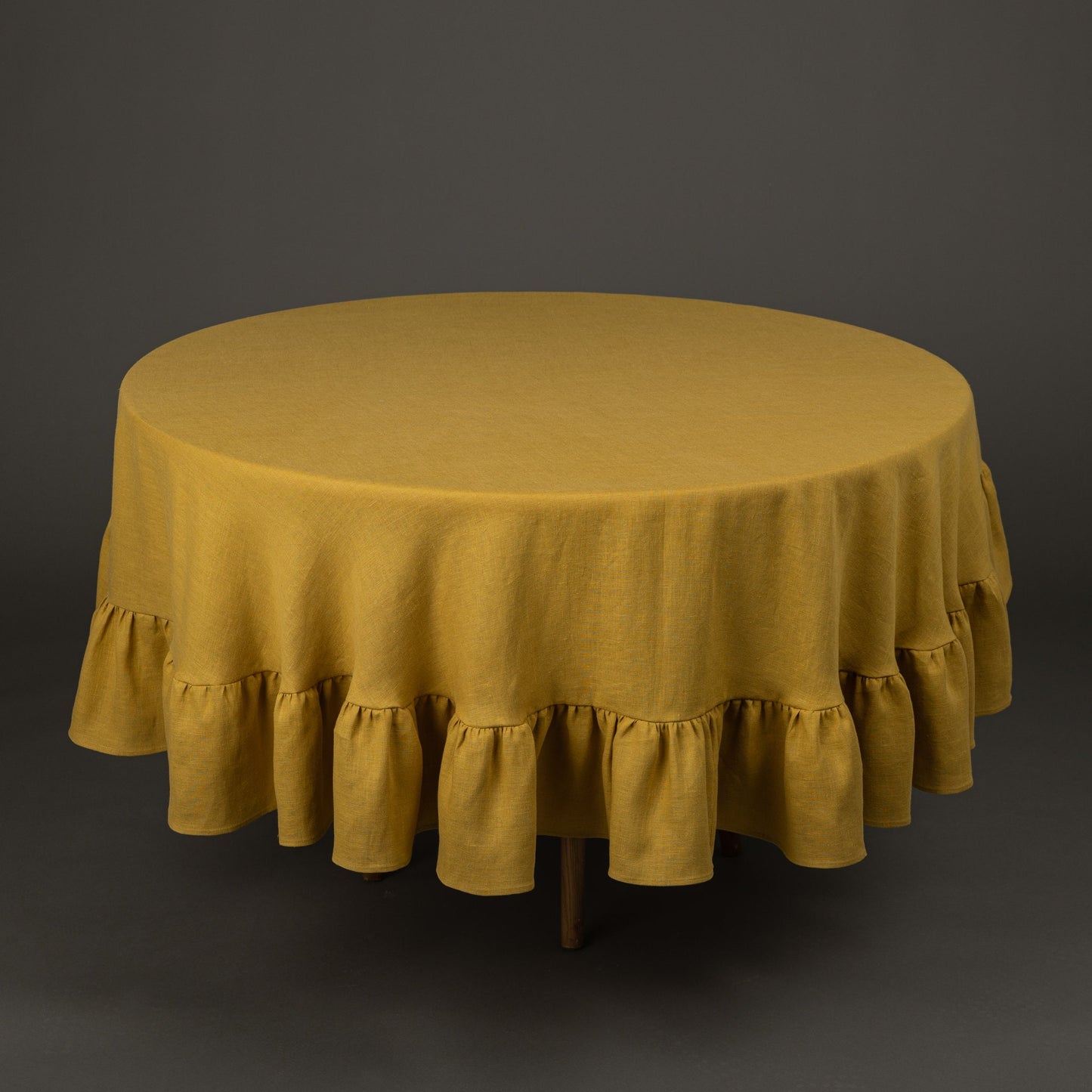 Mustard round tablecloth with ruffles
