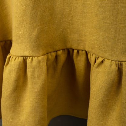 Mustard round tablecloth with ruffles