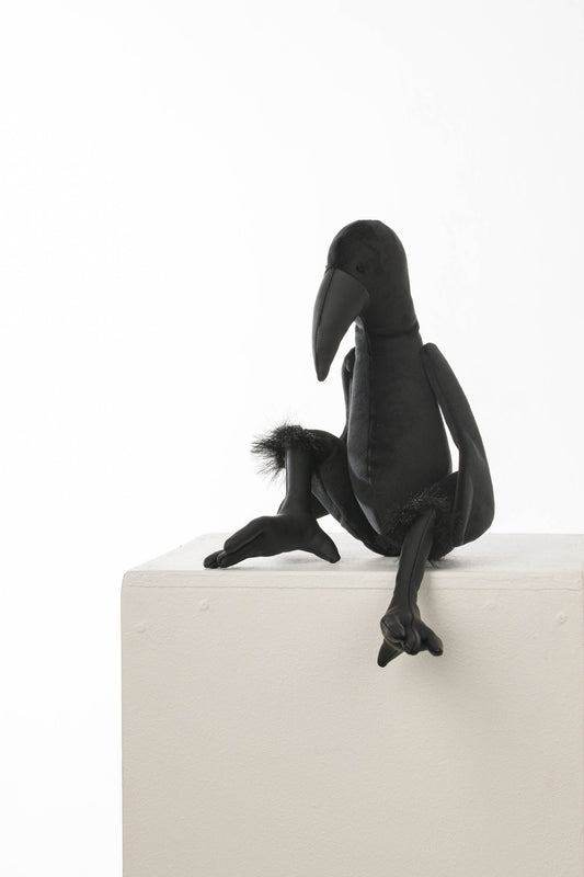 Crow toy with moving joints