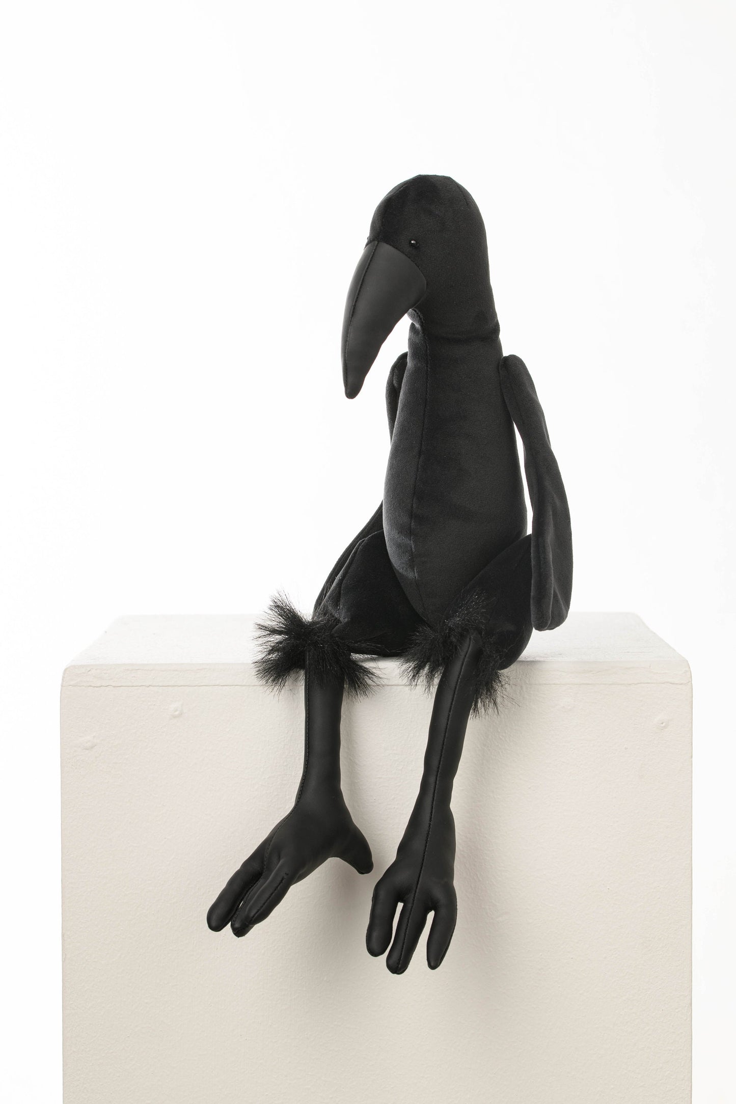 Crow toy with moving joints