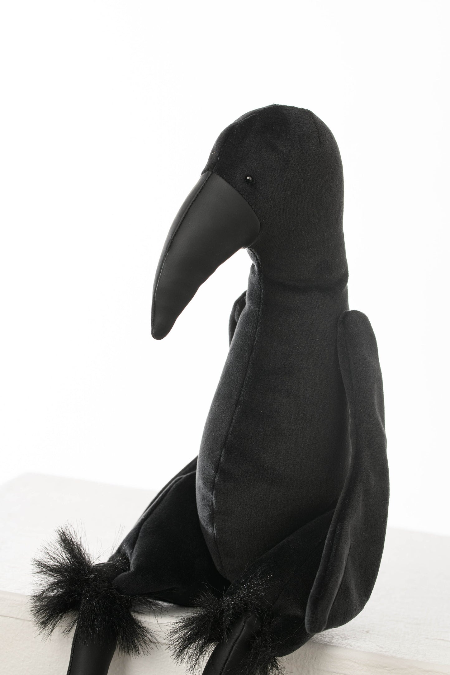 Crow toy with moving joints